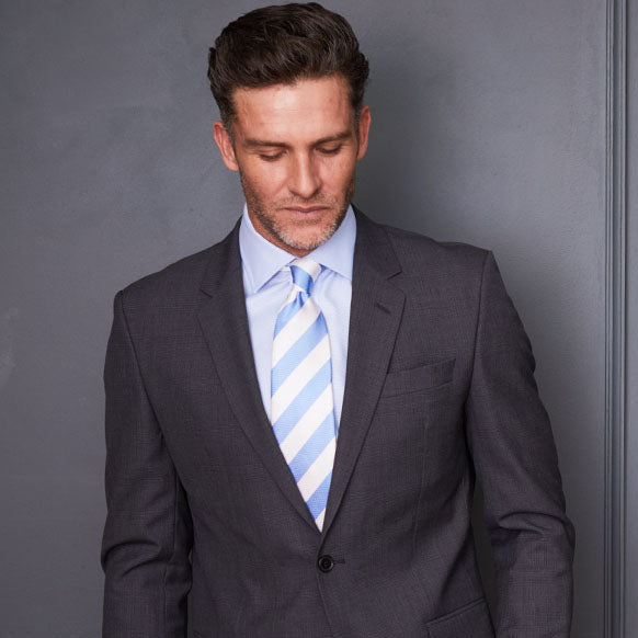 Model wearing a prince of wales suit